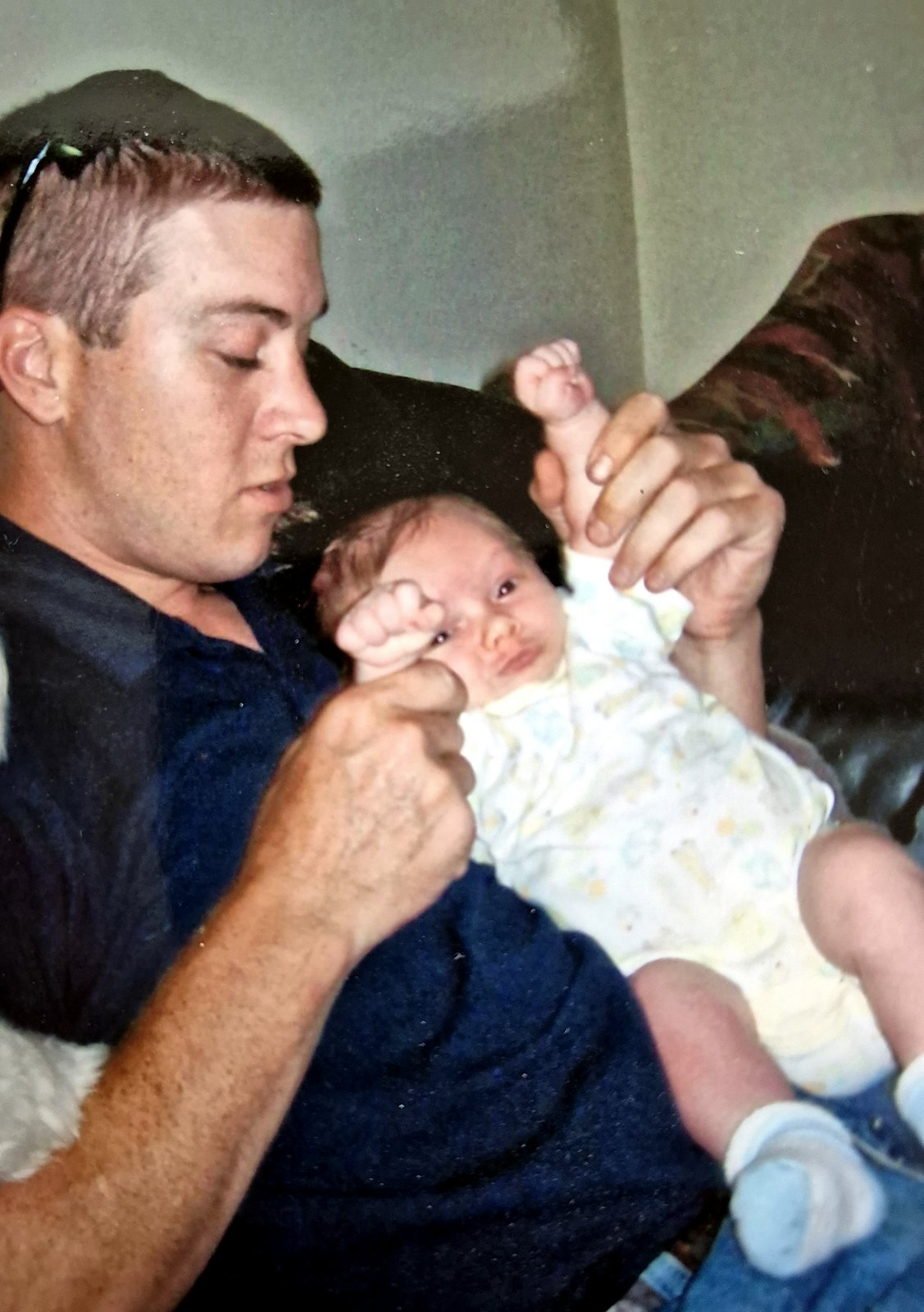 Photo of Patrick holding Maddox